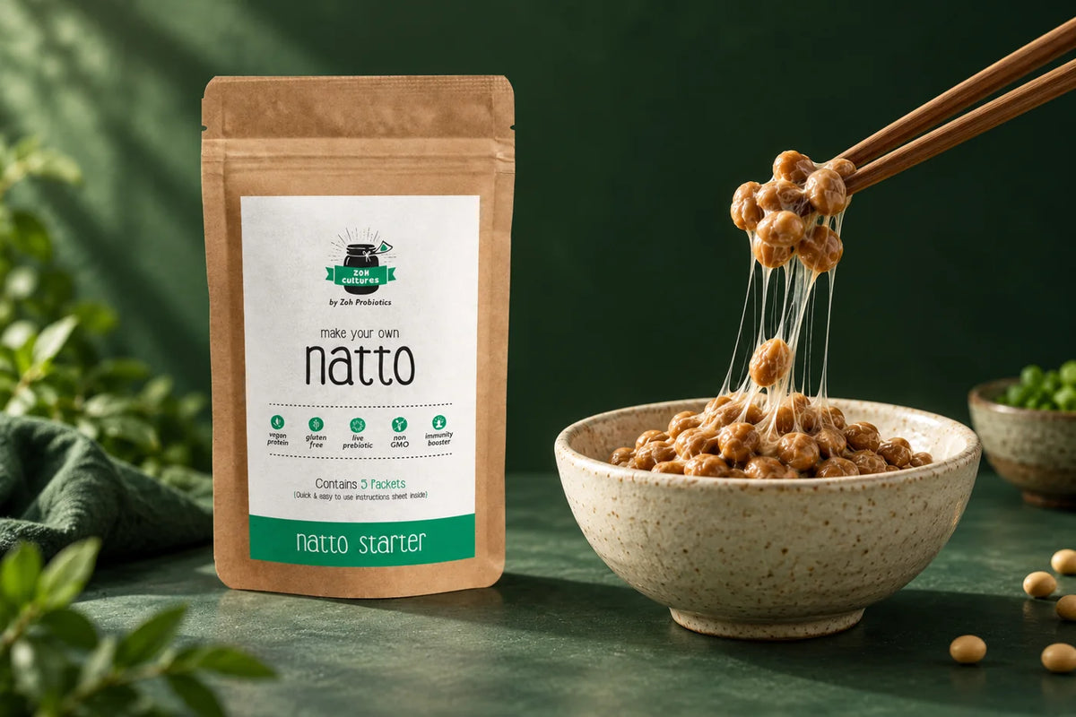 Zoh natto starter pouch beside a natto bowl and chopsticks lifting glossy strands